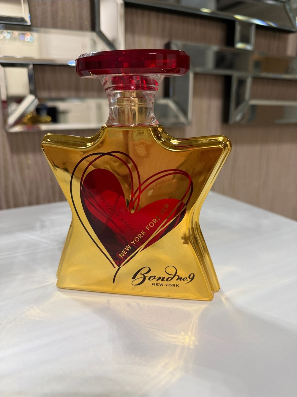 Bond No.9 New York Gold Bottle with Red Heart Accent
